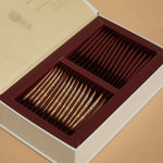 Front view of Pu’er tea mix with tangerine peel box and two individual sachets