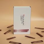 Open box of Pu’er tea mix with tangerine peel showing neatly arranged sachets