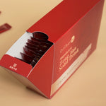 Partially_opened_Oriherb_Zeng_Jian_Solid_Drink_packaging_displaying_inner_sachets_with_beige_background